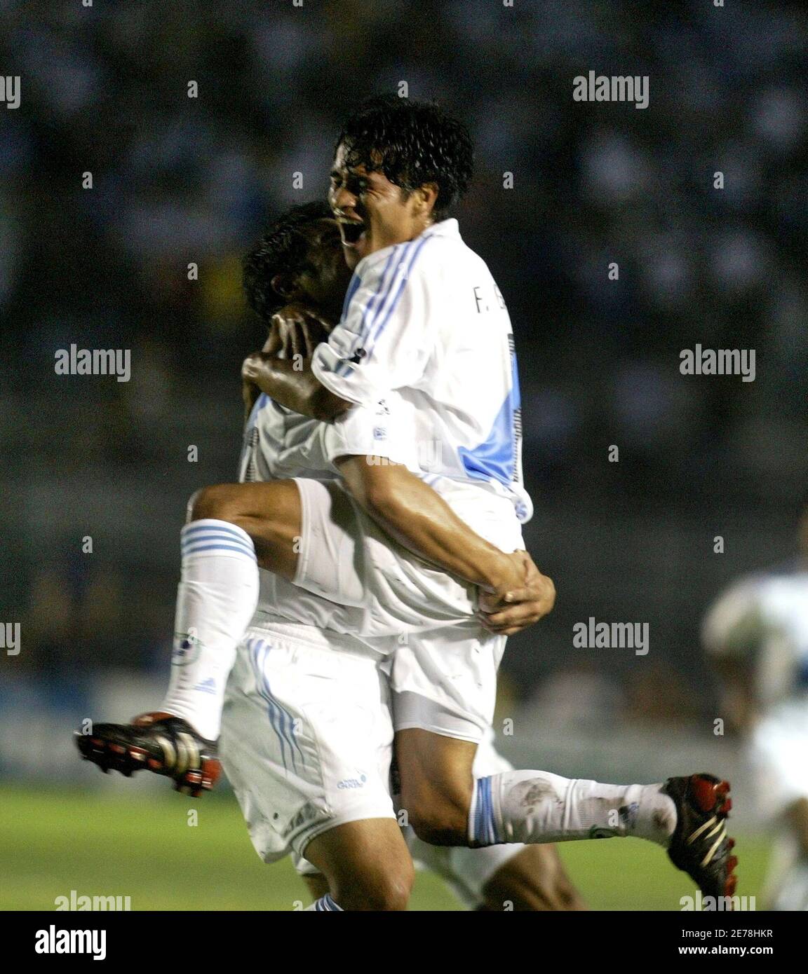 Guatemala's Fredy Garcia (R) celebrates his goal against Costa Rica with  team mate Carlos Ruiz (L) during their 2006 World Cup qualifier soccer  match at the Mateo Flores stadium in Guatemala City,