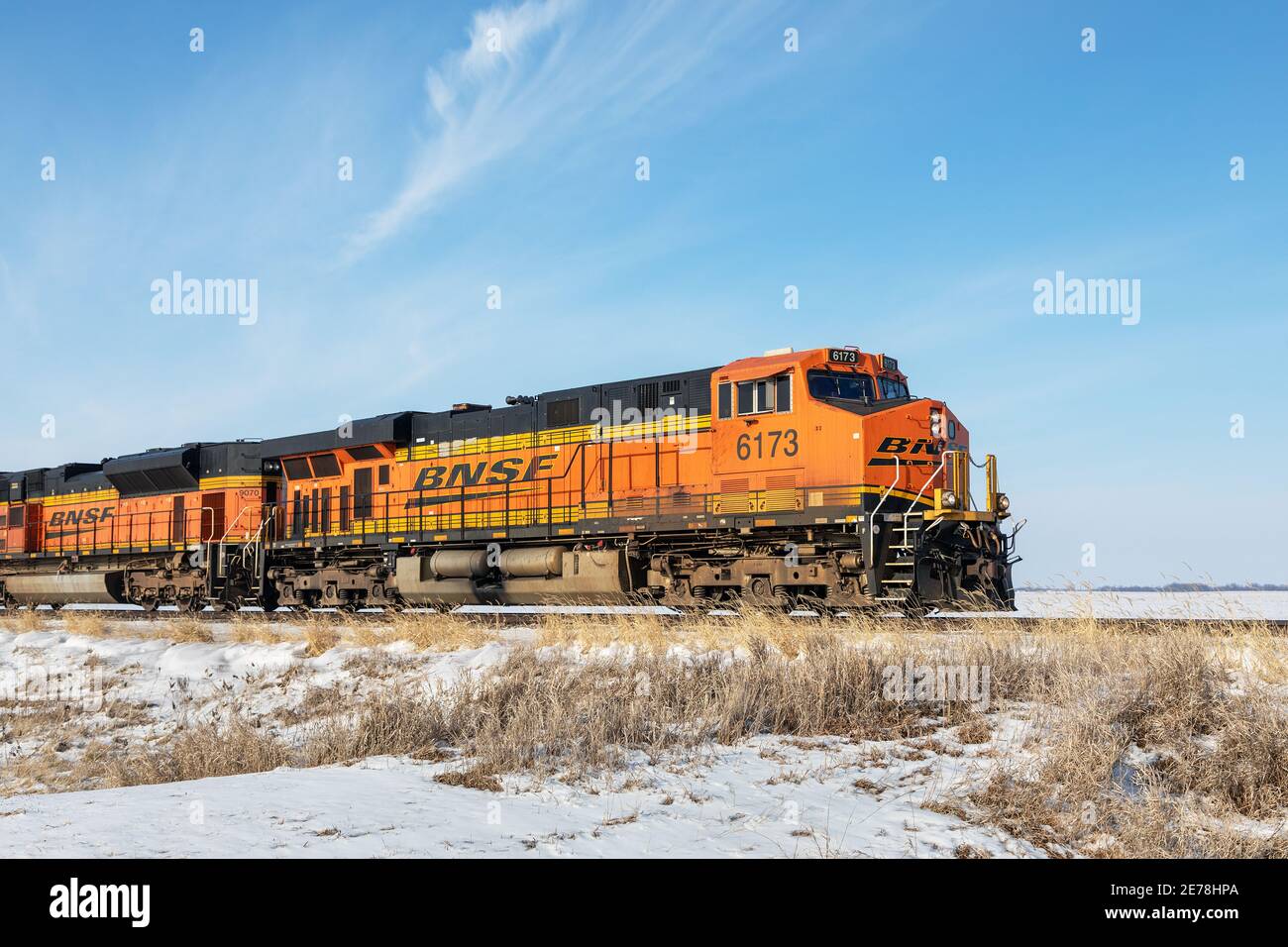 BNSF freight train carrying coal eastbound near Danville, Iowa Stock ...