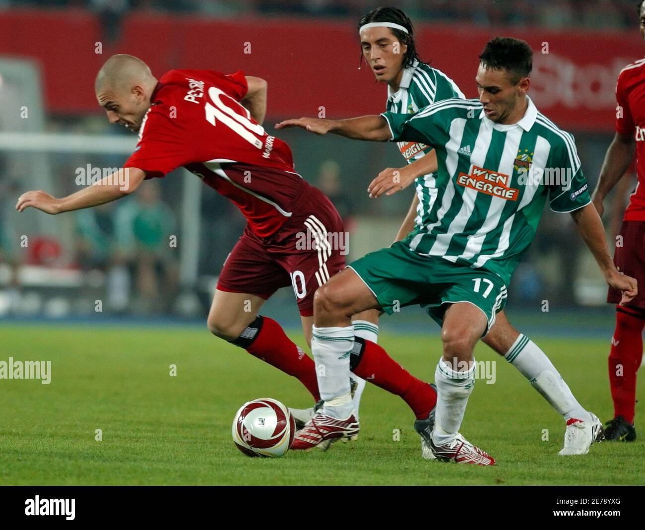 Veli Kavlak (R) of Rapid Vienna and Mladen Petric of Hamburg SV fight for  the ball during their UEFA Europa League Group C first round match at Ernst  Happel Stadium in Vienna