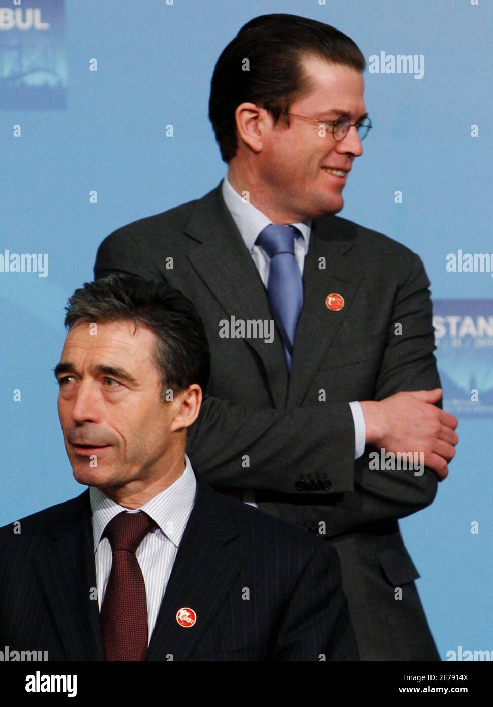 NATO Secretary-General Anders Fogh Rasmussen and Germany's Defence Minister Karl-Theodor zu Guttenberg (back) stand for a group photo during the Informal meeting of NATO Defence Ministers in Istanbul February 5, 2010.  REUTERS/Murad Sezer (TURKEY - Tags: POLITICS) Stock Photo