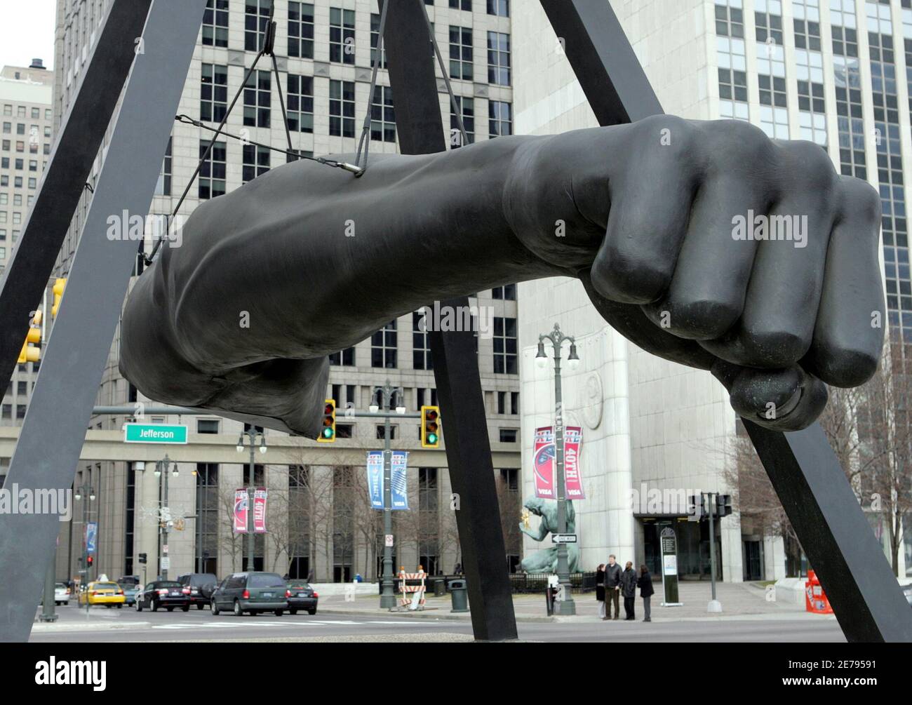 The Joe Louis 'Fist' sculpture hangs from a pyramid shaped support in downtown Detroit, Michigan January 27, 2006.  The bronze extended arm and fist is the city's tribute to the late boxing hero 'The Brown Bomber' Joe Louis. The fist is one of the first things visitors will see as they exit from one of the main expressways leading into the heart of downtown Detroit when it hosts [Super Bowl XL on Feb. 5 at Ford Field.] Stock Photo