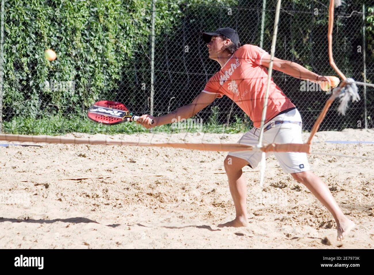 Italian beach tennis champion Paolo Tazzari in action at Quanta Sport  Village Leisure Centre, Milan in this picture taken July 5, 2007. The  growing sport of beach tennis is ready to further