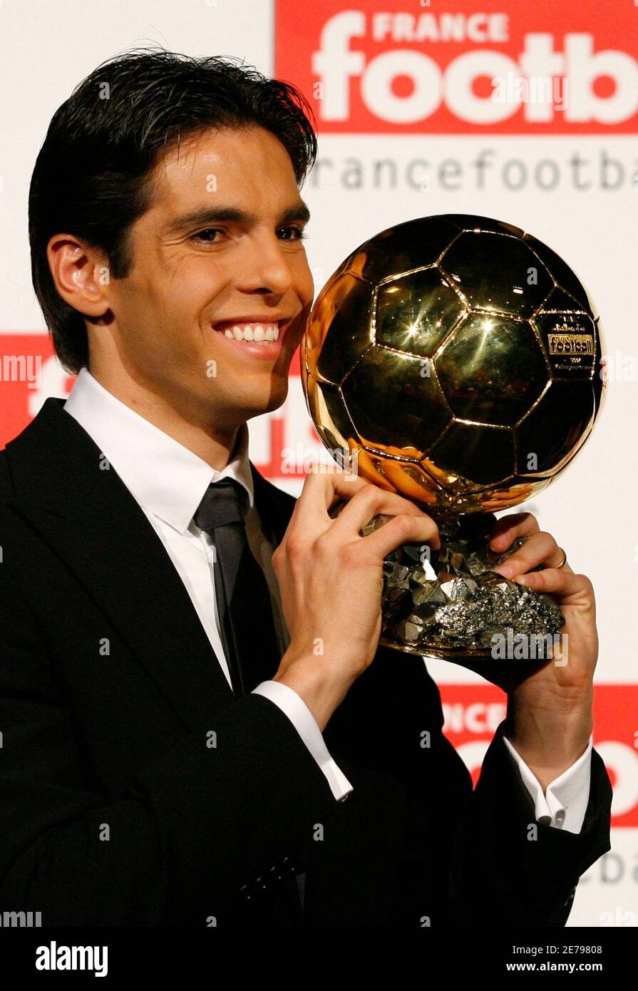 AC Milan and Brazil playmaker Kaka holds the 2007 Ballon d'Or trophy in  Paris December 2, 2007. Kaka was awarded the 2007 Ballon d'Or by French  magazine France Football and is already
