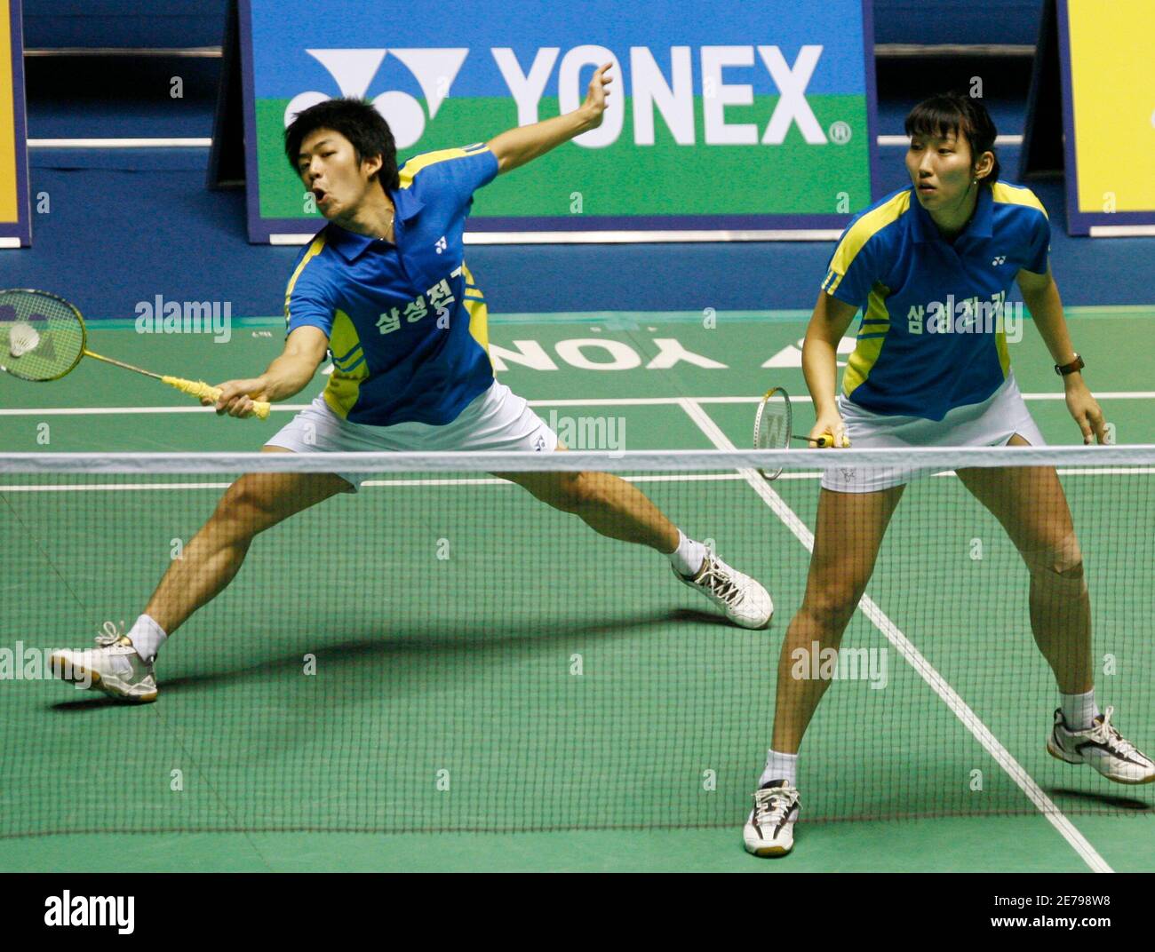 South Koreau0027s Lee Yong-dae (front) returns a shot as his teammate 