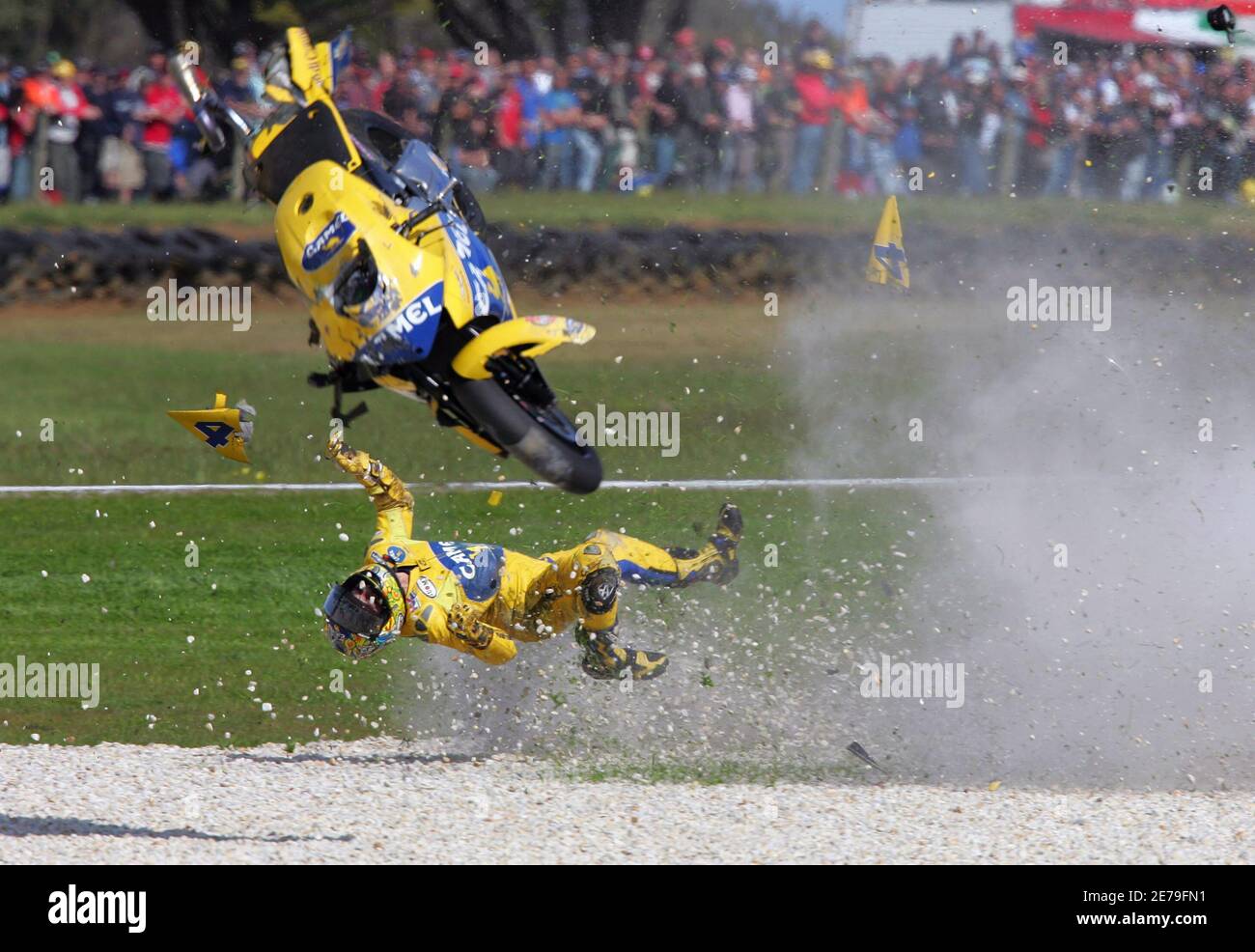 MotoGP rider Alex Barros of Brazil crashes his Yamaha at high speed during  the Australian Motorcycle