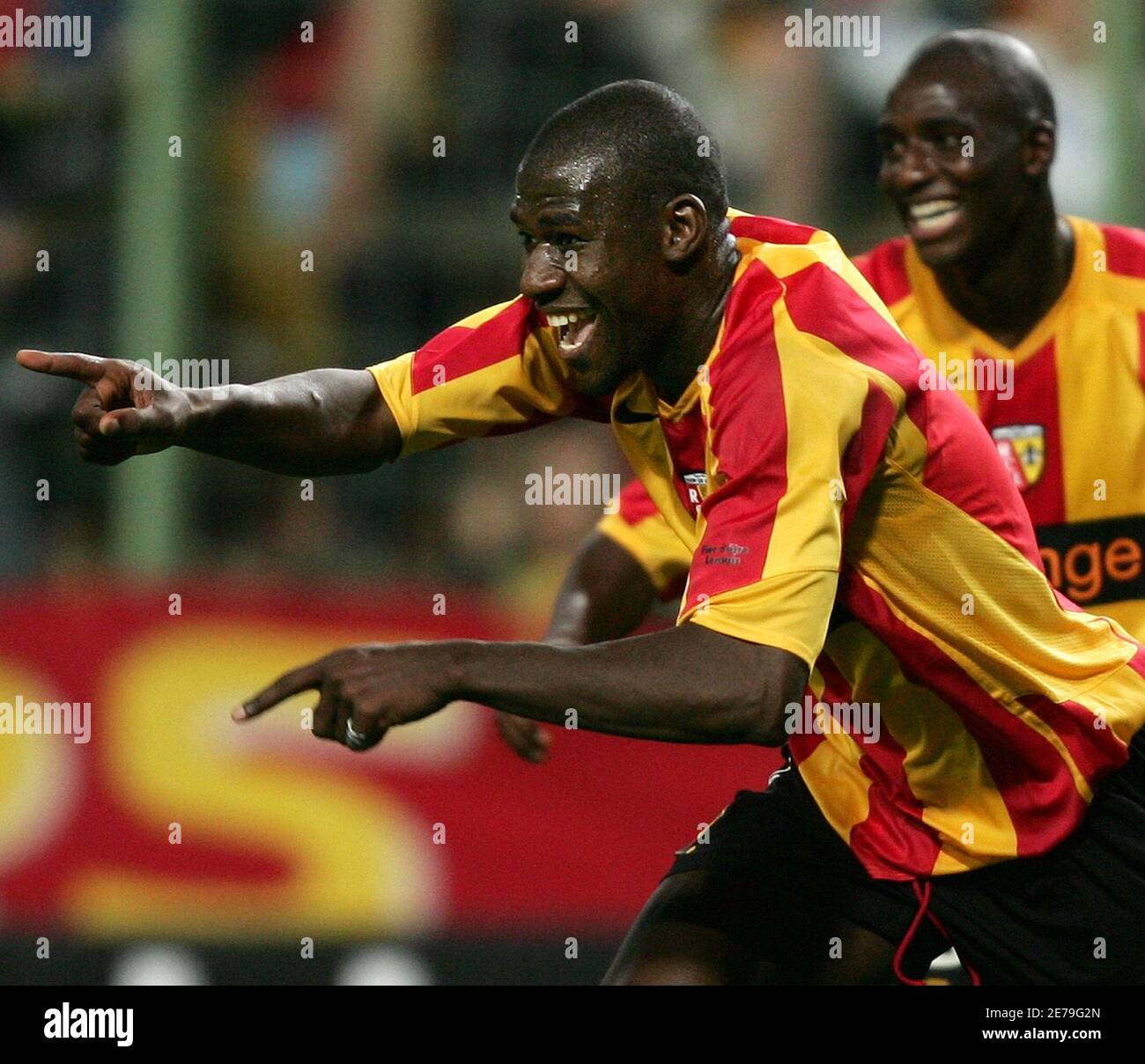 Racing Lens' Coulibaly celebrates with team mate Diarra during their  Intertoto Cup Final at the Felix Bollaert stadium in Lens. Racing Lens'  Adama Coulibaly (L) celebrates his goal with team mate Alou