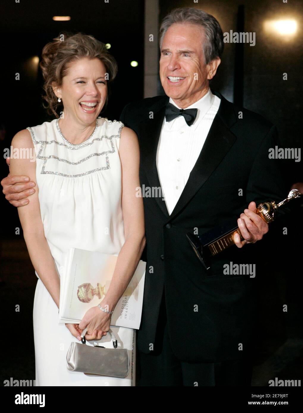 Actor Warren Beatty (R) and wife Annette Bening arrive at the Paramount