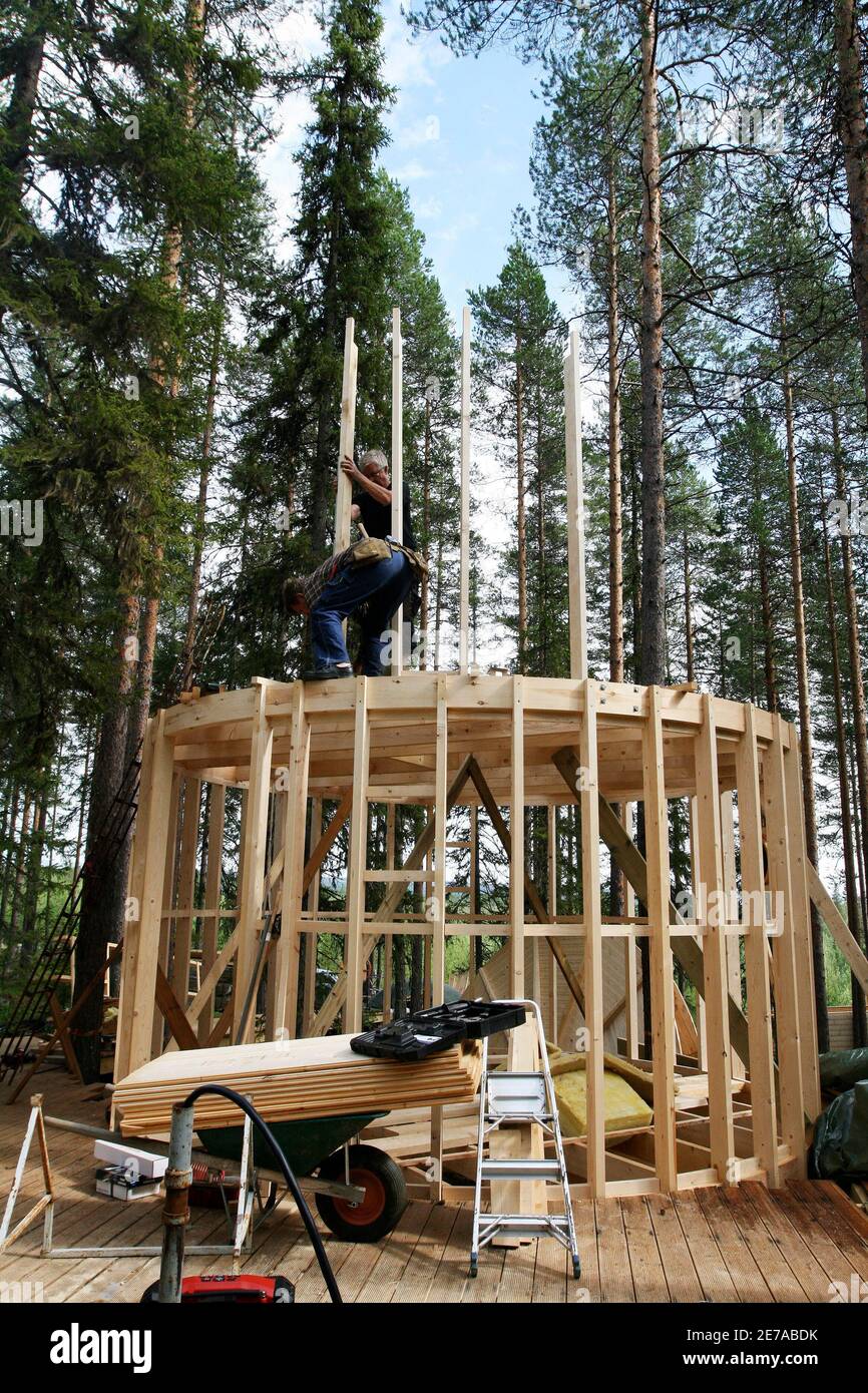 The TreeSauna is seen under construction on the site of Treehotel in the Swedish village of Harads, July 5, 2010. A lofty new hotel concept is set to open in a remote village in northern Sweden, which aims to elevate the simple treehouse into a world-class destination for design-conscious travellers. Treehotel, located in Harads about 60 km south of the Arctic Circle, will consist of four rooms when it opens on July 17th: The Cabin, The Blue Cone, The Nest and The Mirrorcube. Picture taken July 5, 2010.     To match Reuters Life! SWEDEN-TREEHOTEL/    REUTERS/Matt Cowan    (SWEDEN - Tags: ENVIR Stock Photo
