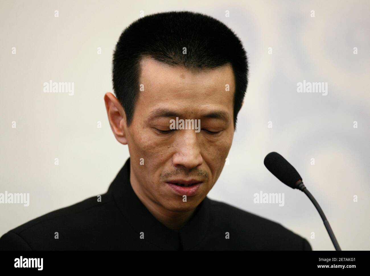 Cai Mingchao, the Chinese man who claims he was the winning bidder for two bronze sculptures at a Paris auction last week, speaks at a news conference in Beijing March 2, 2009. Cai, an adviser to a fund that seeks to retrieve looted treasures, said on Monday that he was the winning bidder for the sculptures at the auction, but he had no intention paying for the controversial treasures looted from Beijing. The two sculptures, heads of a rat and a rabbit, were from the estate of Yves Saint Laurent and sold for 15 million euros each ($20 million) to a telephone bidder during the auction of the la Stock Photo