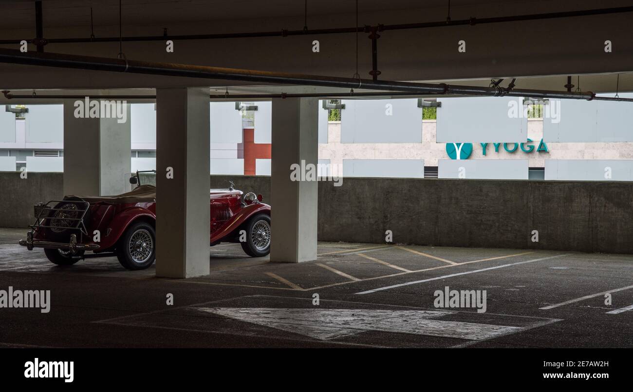 Vintage car in parking lot Stock Photo - Alamy