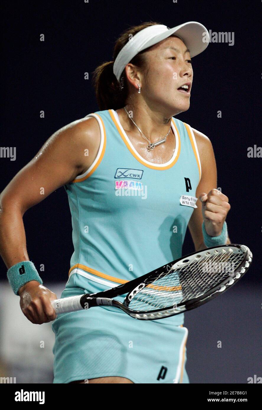 Japan's Ai Sugiyama celebrates after scoring a point against Czech  Republic's Nicole Vaidisova during their second round match at the China  Open tennis tournament in Beijing September 20, 2006. REUTERS/Claro Cortes  IV (