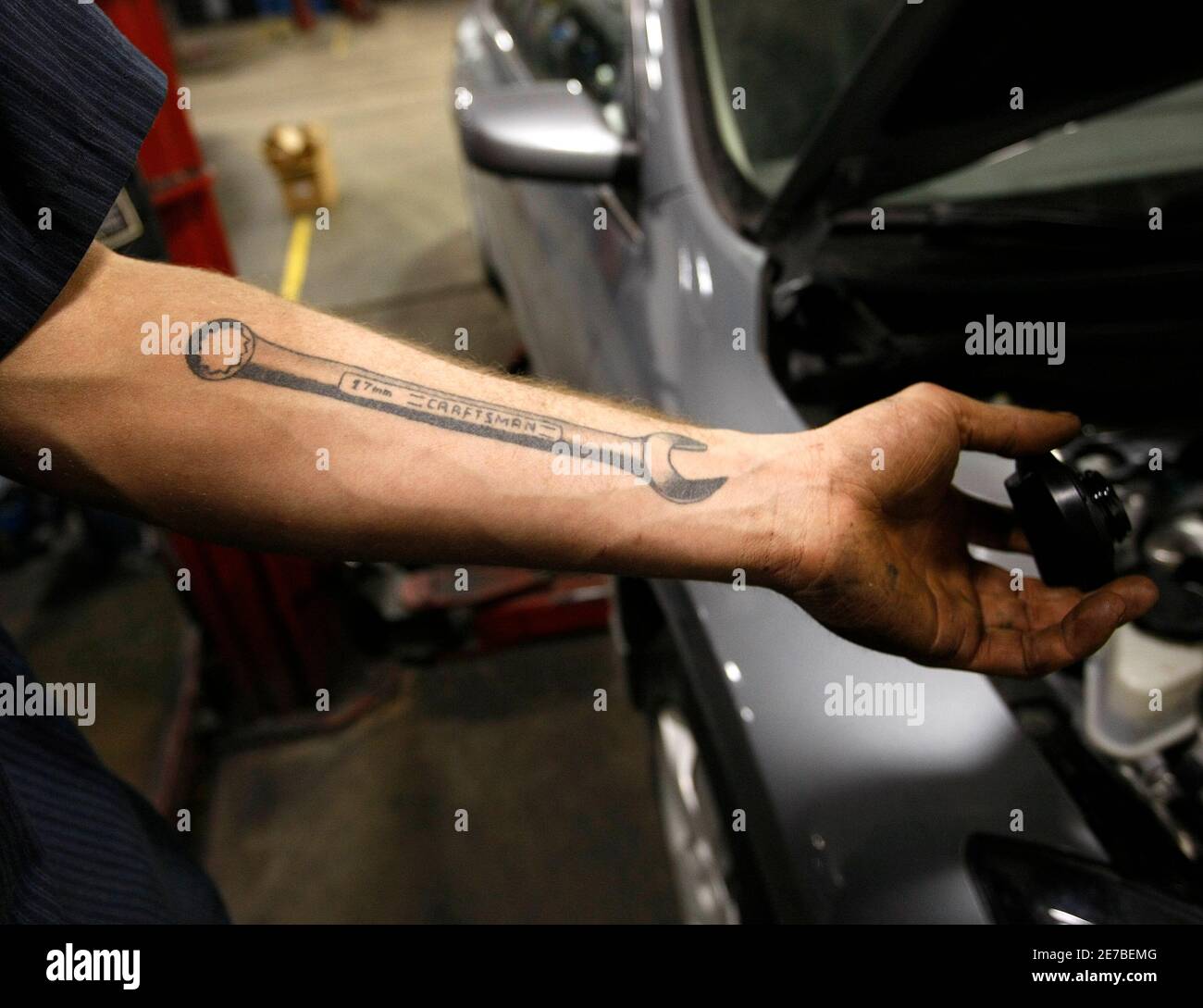 Shows Off His Tattoo High Resolution Stock Photography And Images Alamy