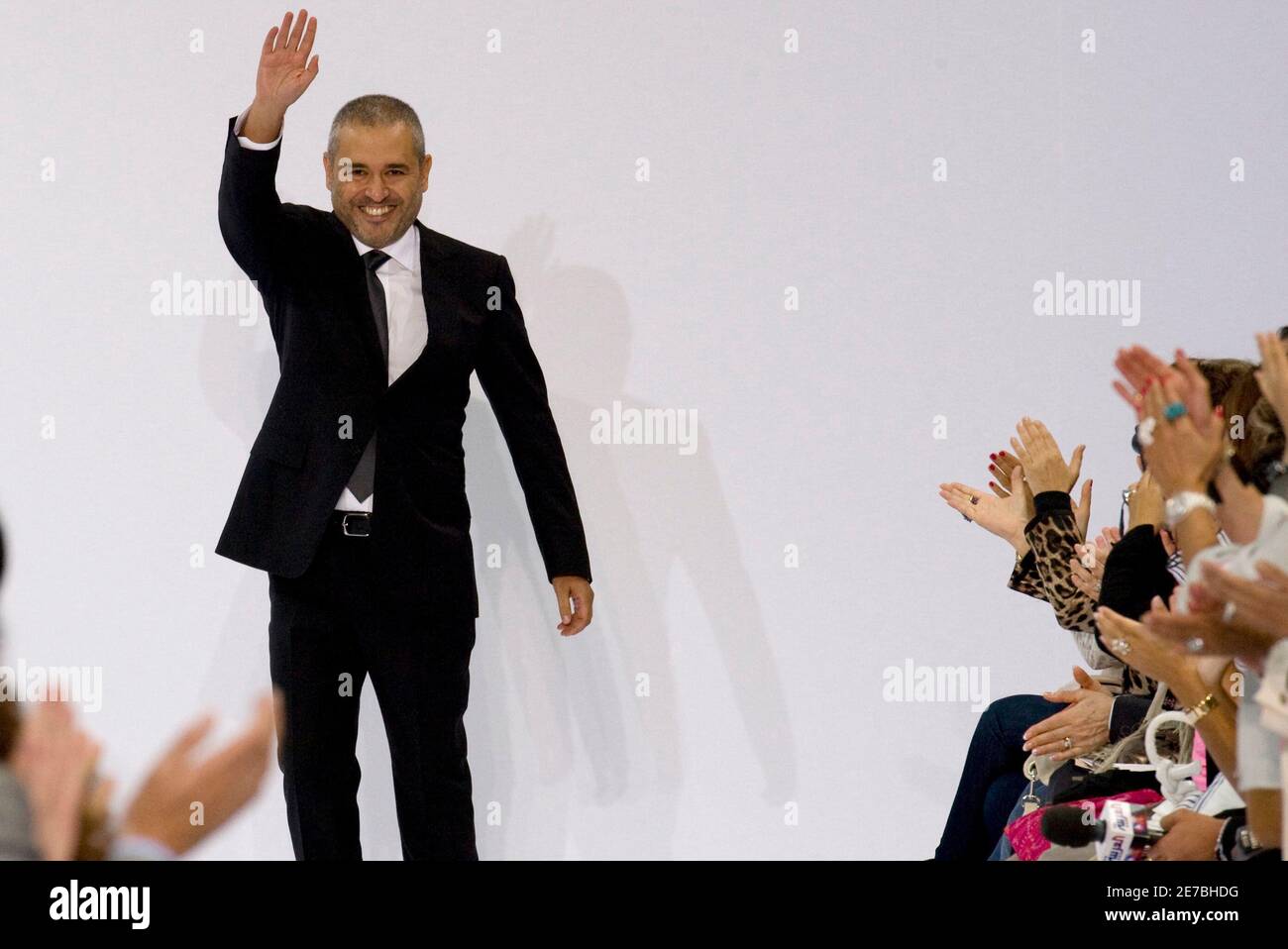 Lebanese designer Elie Saab appears at the end of his Autumn/Winter 2009-2010 Haute Couture fashion show in Paris July 8, 2009. REUTERS/Pascal Rossignol (FRANCE FASHION) Stock Photo