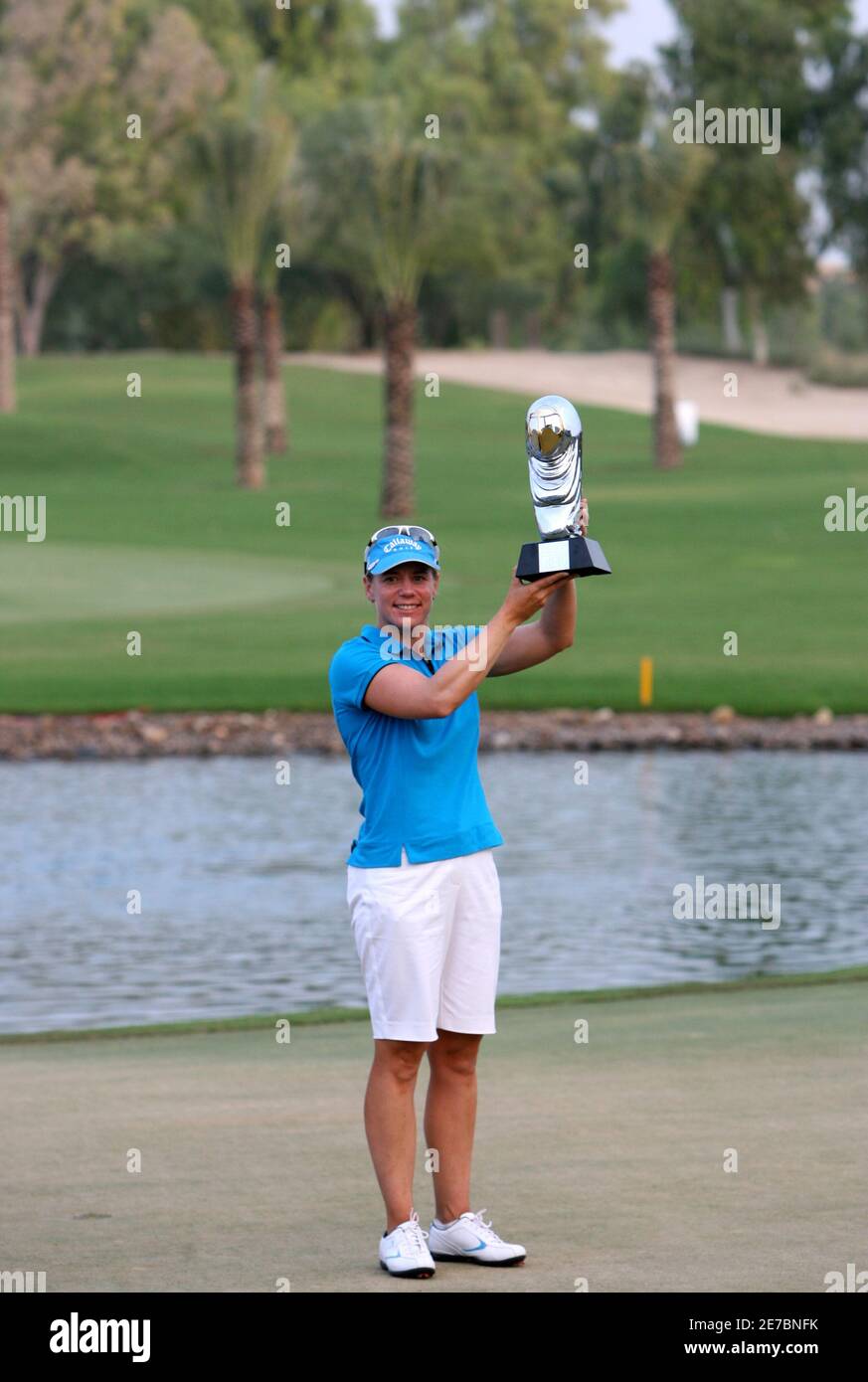 Annika Sorenstam of Sweden holds up her trophy she celebrates her at the Dubai Ladies Masters golf tournament in Dubai, United Arab Emirates October 29, REUTERS/Ahmed Jadallah Stock Photo - Alamy