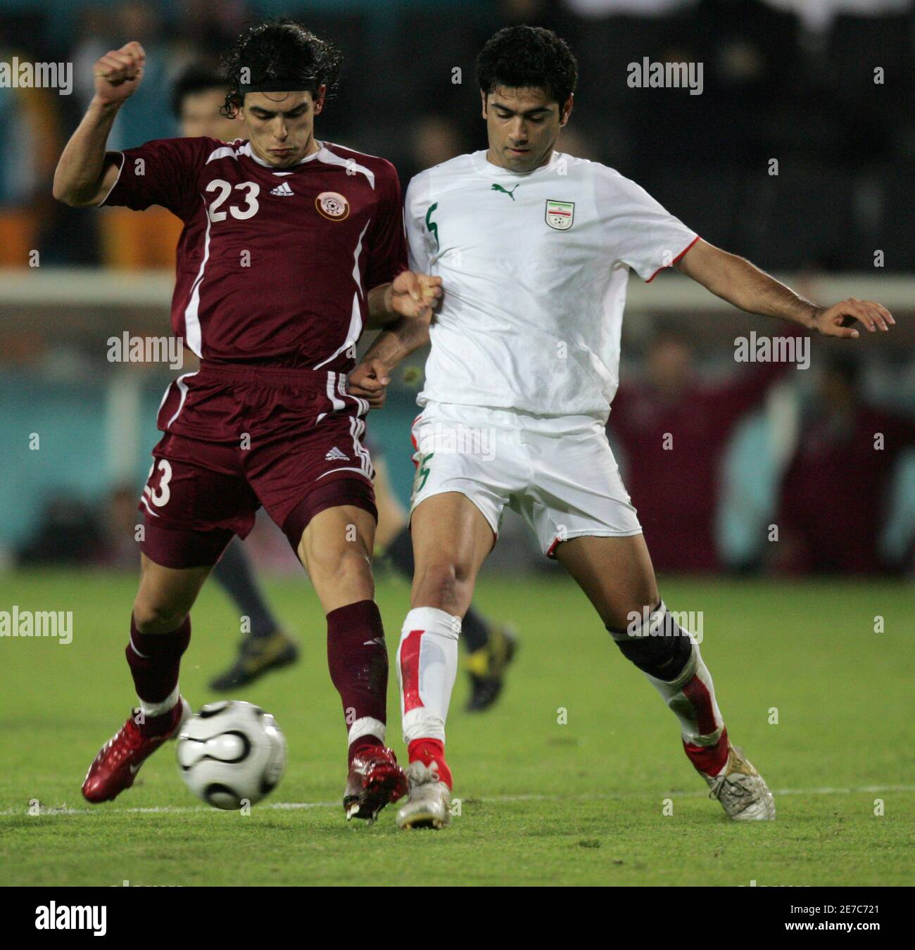 Qatar S Sebastian Quintana L Fights For The Ball With Pejman Montazeri Of Iran During Their Semi Final Soccer Match At The Asian Games In Doha December 12 06 Reuters Fadi Alassaad Qatar Stock Photo Qatar S Sebastian Quintana L Fights For The Ball With Pejman Montazeri Of Iran During Their Semi Final Soccer Match At The Asian Games In Doha December 12 06 Reuters Fadi Alassaad Qatar Stock Photo