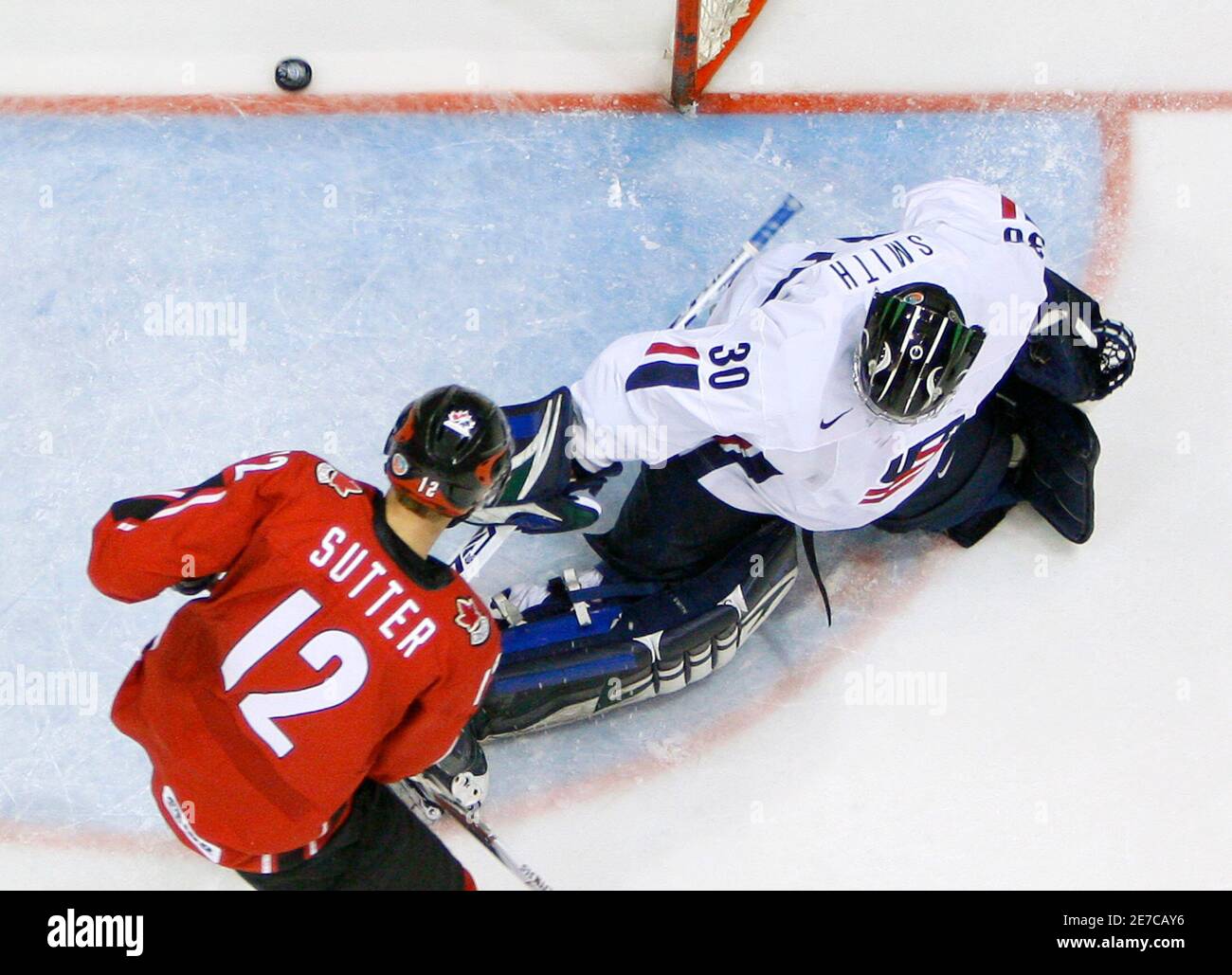 canadas-brandon-sutter-l-watches-a-goal-get-past-team-usa-goalie-jeremy-smith-during-the-third-period-of-their-semi-final-game-at-the-2008-iihf-u20-world-junior-hockey-championships-in-pardubice-january-4-2008-reutersshaun-best-czech-republic-2E7CAY6.jpg
