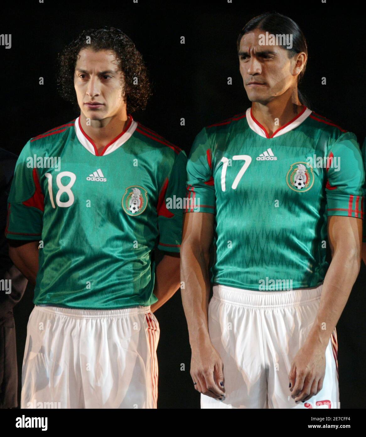 Mexico's national soccer players Andres Guardado (L) and Francisco Palencia  stand together during the presentation of their national soccer jerseys for  the 2010 FIFA World Cup at the National Museum of Anthropology