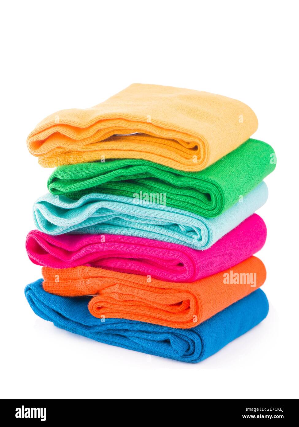 colored socks stacked on a white background Stock Photo