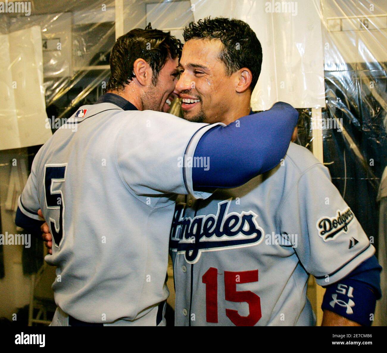 Los Angeles Dodgers' Rafael Furcal (R) and Nomar Garciaparra hug after  beating the San Francisco Giants in their National League baseball game and  clinching a spot in the playoffs in San Francisco,