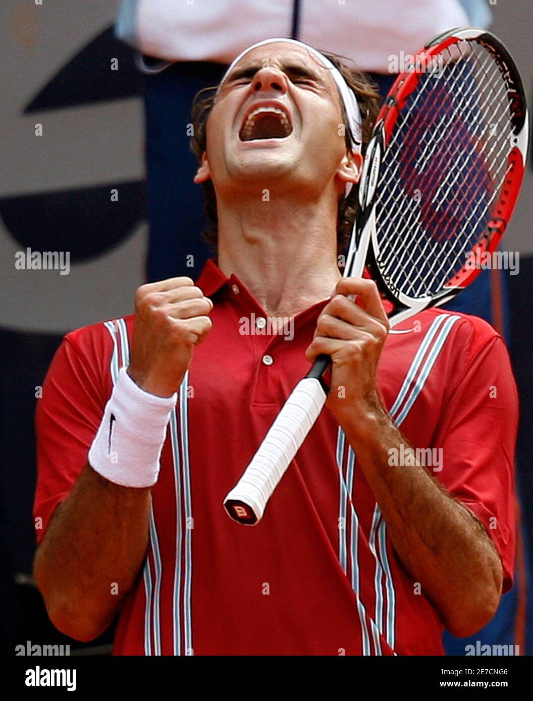 Switzerland's Roger Federer celebrates after defeating Spain's Rafael Nadal  in a final match at the Hamburg