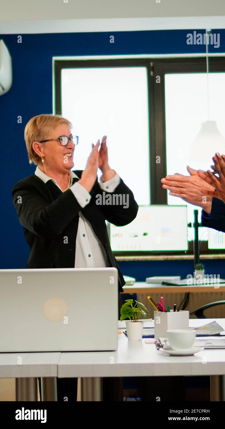 Motivated happy diverse business team people clapping celebrating ...