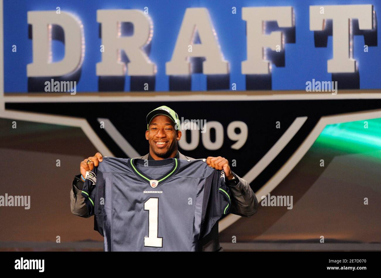 Linebacker Aaron Curry from Wake Forest University holds his jersey after  being selected by the Seattle Seahawks as the number four overall pick in  the 2009 NFL Draft at Radio City Music