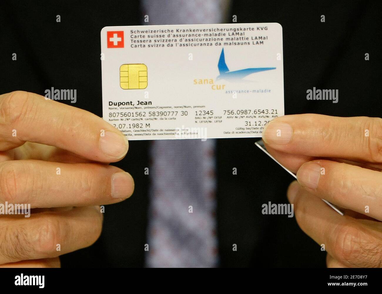 Swiss President Pascal Couchepin Shows The New Swiss Health Insurance Card During A News Conference In Bern April 1 08 Reuters Pascal Lauener Switzerland Stock Photo Alamy
