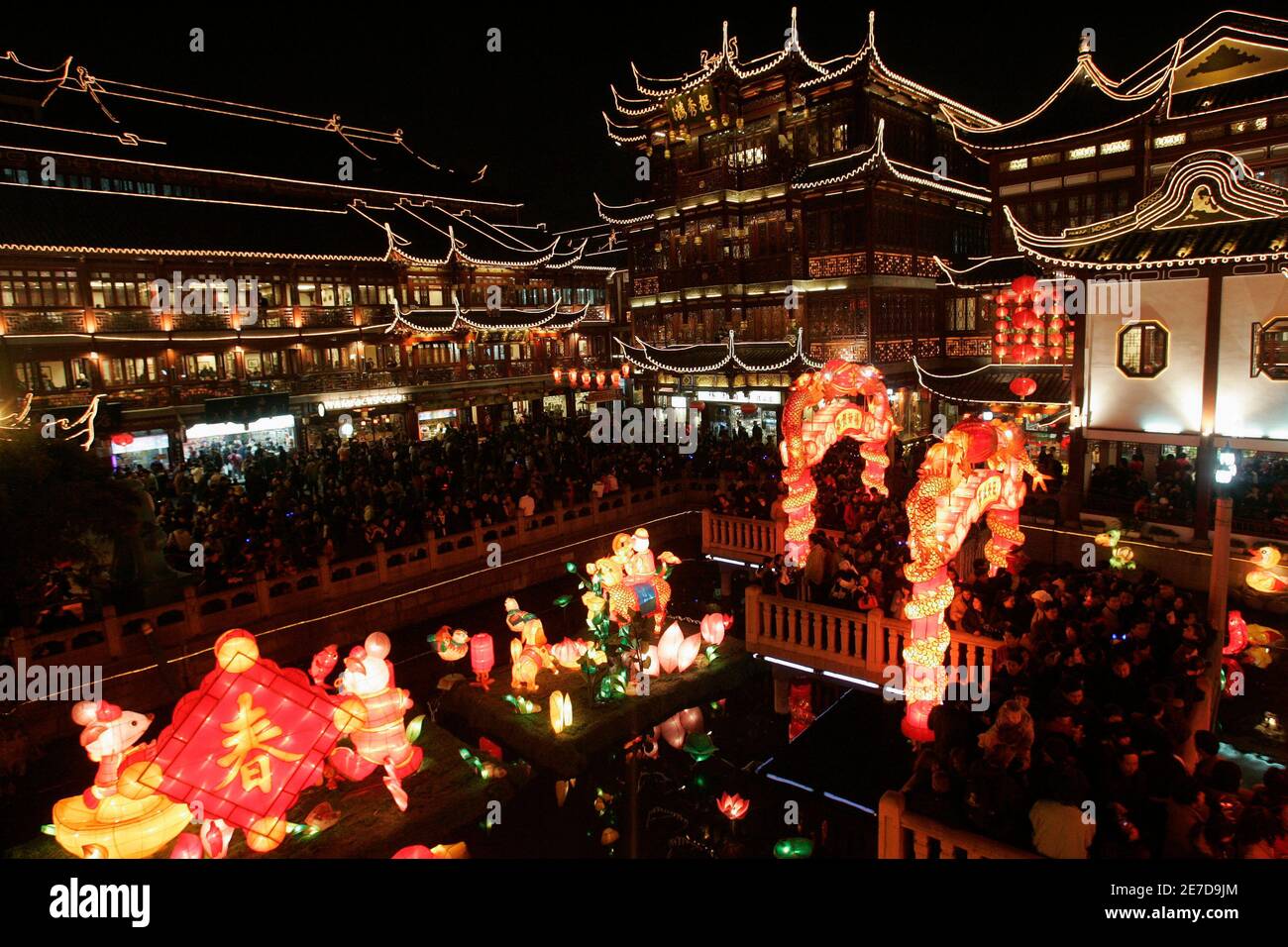 Visitors walk around the Yu Gardens, decorated with special decorations for the last day of the Chinese New Year, in Shanghai February 21, 2008. The last day of the Chinese New Year, known as the Lantern Festival, is celebrated today. REUTERS/Aly Song (CHINA) Stock Photo