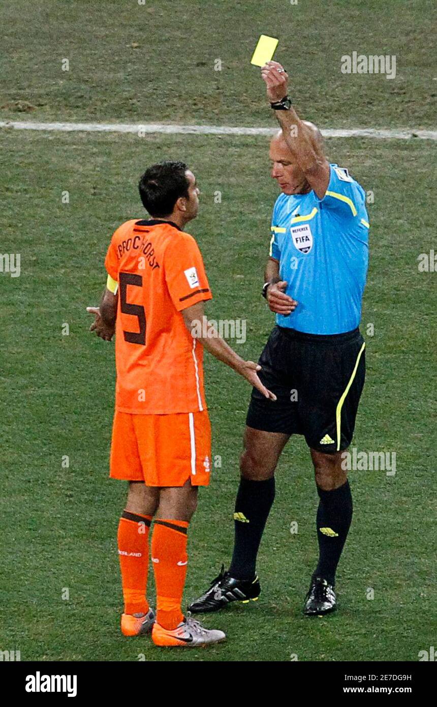 picture Van Bronckhorst Fifa Cards https www alamy com referee howard webb of england shows the yellow card to netherlands giovanni van bronckhorst during their 2010 world cup final soccer match against spain at soccer city stadium in johannesburg july 11 2010 reutersoleg popov south africa tags sport soccer world cup image400439245 html