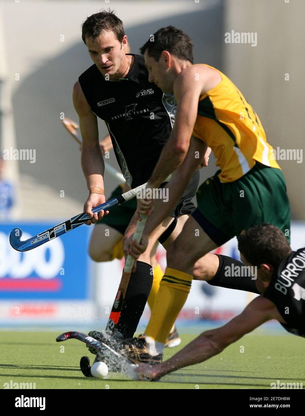 New Zealand's Blair Hopping (L) and Philip Burrow (R) fights for the