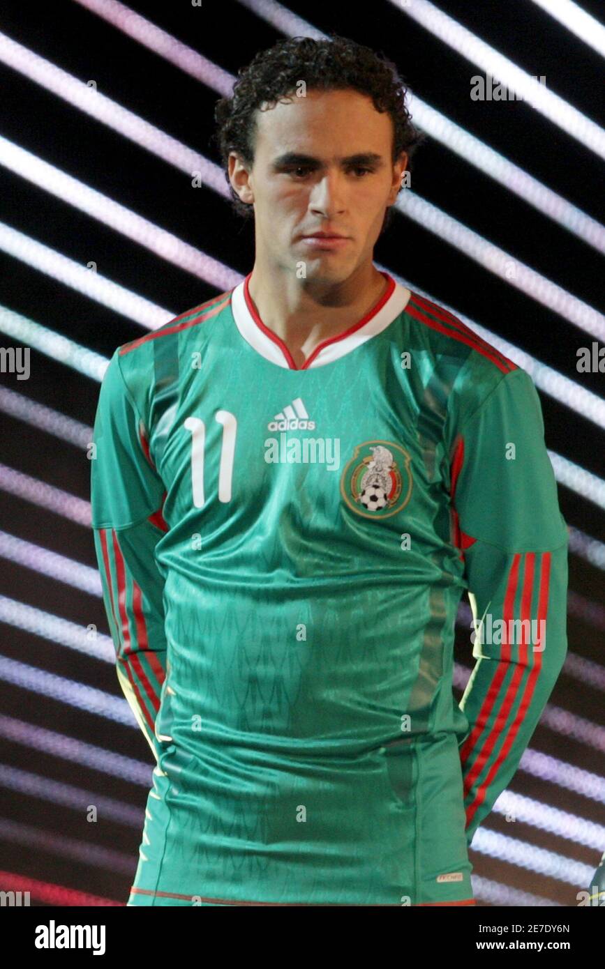 Mexico's national soccer player Enrique Esqueda poses during the  presentation of their national soccer jerseys for the 2010 FIFA World Cup  at the National Museum of Anthropology in Mexico City November 9,
