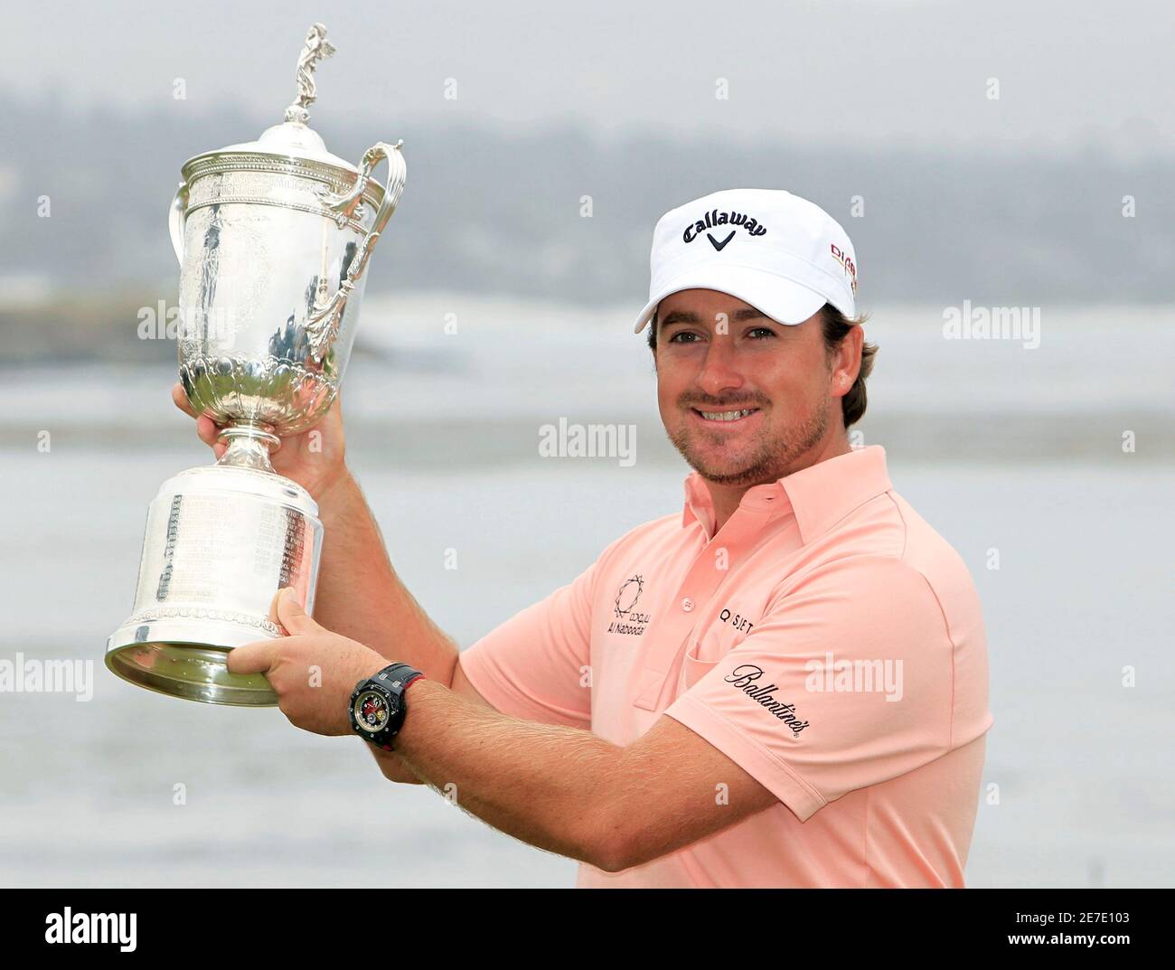 Graeme McDowell of Northern Ireland holds the U.S. Open trophy after  winning the 110th U.S. Open in Pebble Beach, California on June 20, 2010.  McDowell shot 3-over par for the day to