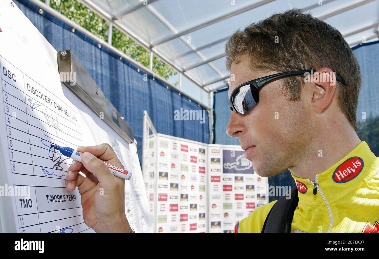 Discovery Channel's team rider Stijn Devolder of Belgium signs the starting  list before the start of the eighth and last stage of the 59th Austrian  Cycling Tour in the village of Podersdorf