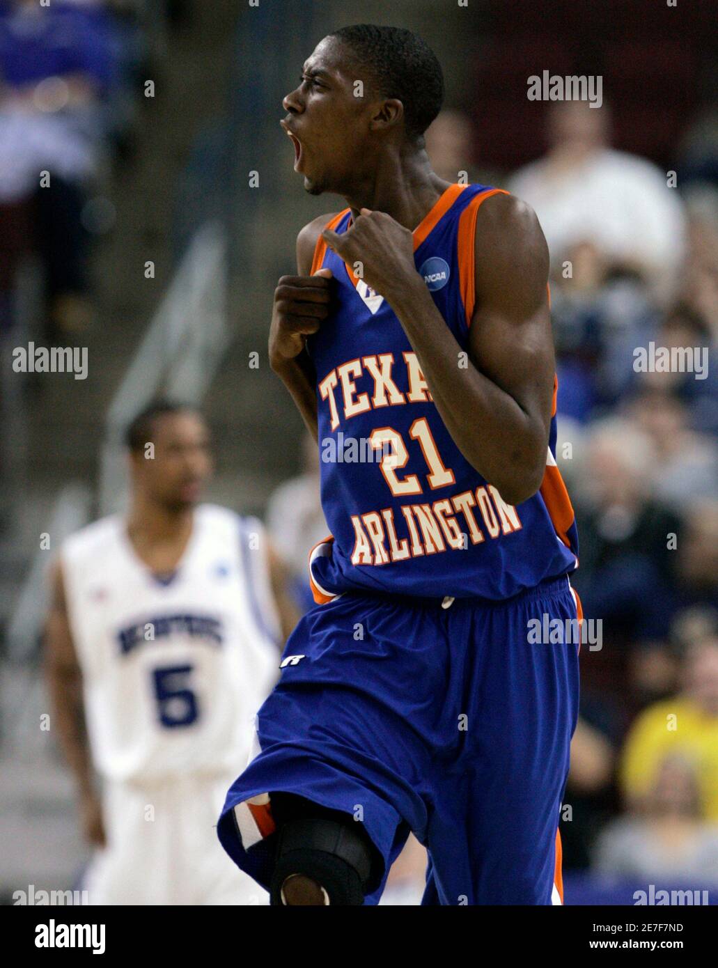 Texas-Arlington's Trey Parker celebrates after making a shot against  Memphis during the first half of their first round NCAA men's basketball  tournament game in Little Rock, Arkansas March 21, 2008. REUTERS/Jessica  Rinaldi (
