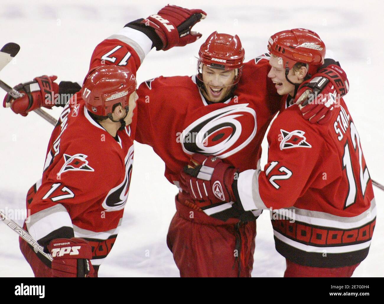 Carolina Hurricanes Rod Brind'Amour (L), Matt Cullen (C) and Eric Staal  celebrate Cullen's shootout goal against the Toronto Maple Leafs during  their NHL game in Raleigh, North Carolina November 25, 2005. The