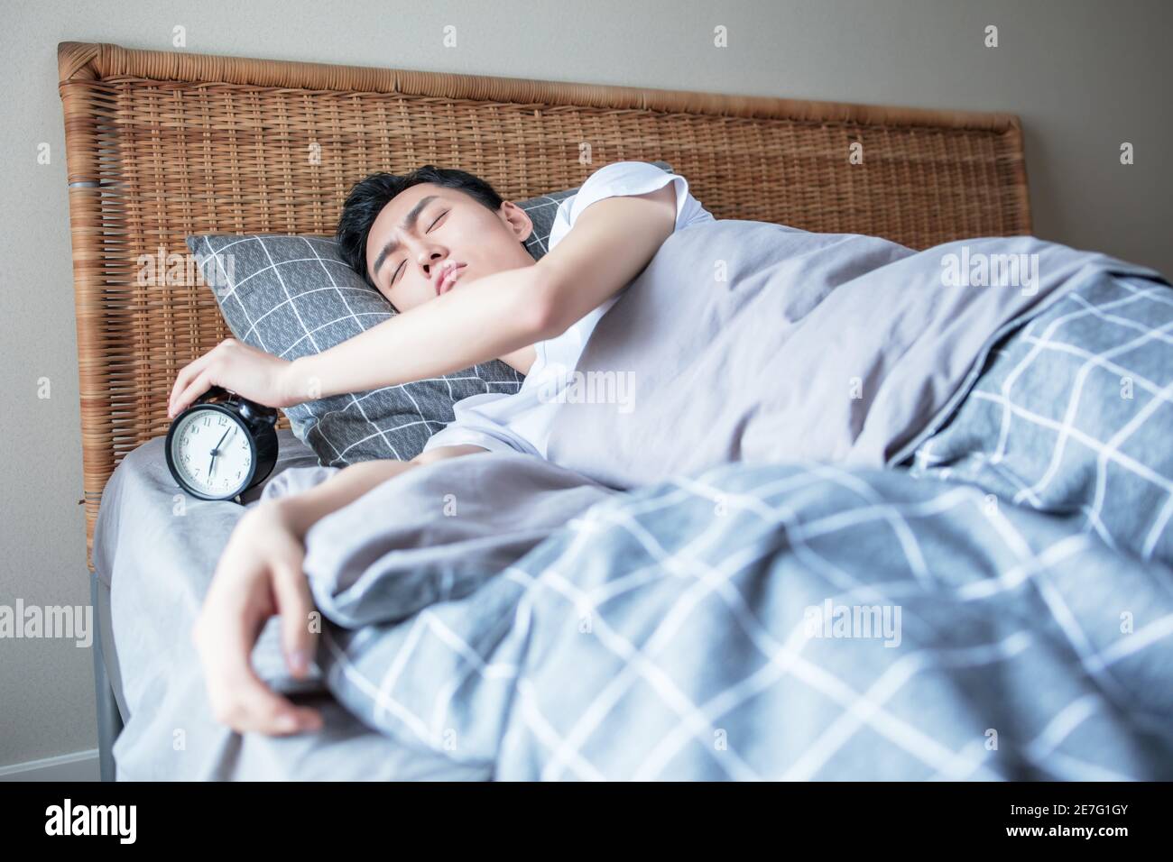 man stop alarm clock ringing Stock Photo Alamy