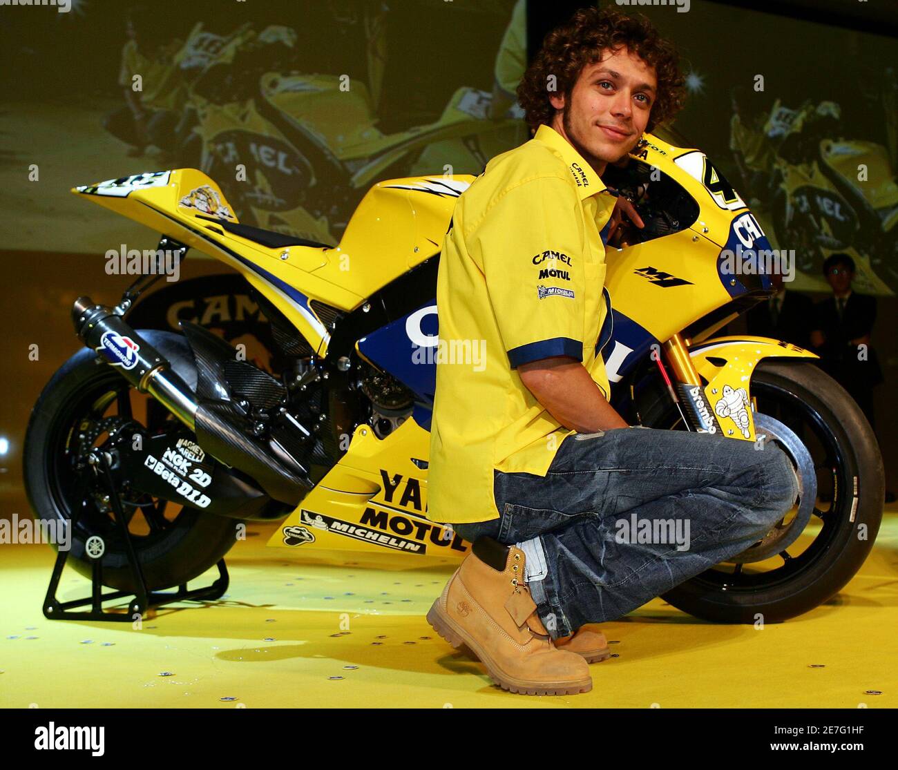 MotoGP world champion Valentino Rossi of Italy poses with his new Yamaha  YZR-M1 2006 during a news conference in Milan, northern Italy, February 27,  2006. REUTERS/Daniele La Monaca Stock Photo - Alamy