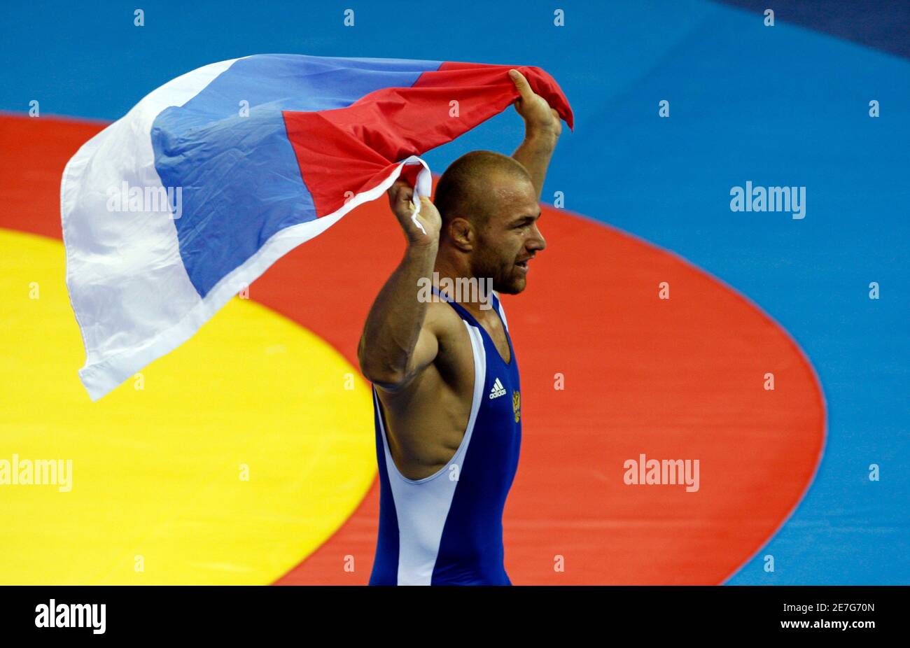 Aslanbek Khushtov of Russia celebrates after defeating Mirko Englich of Germany at the men's 96kg Greco-Roman gold medal wrestling competition at the Beijing 2008 Olympic Games August 14, 2008.     REUTERS/Oleg Popov (CHINA) Stock Photo