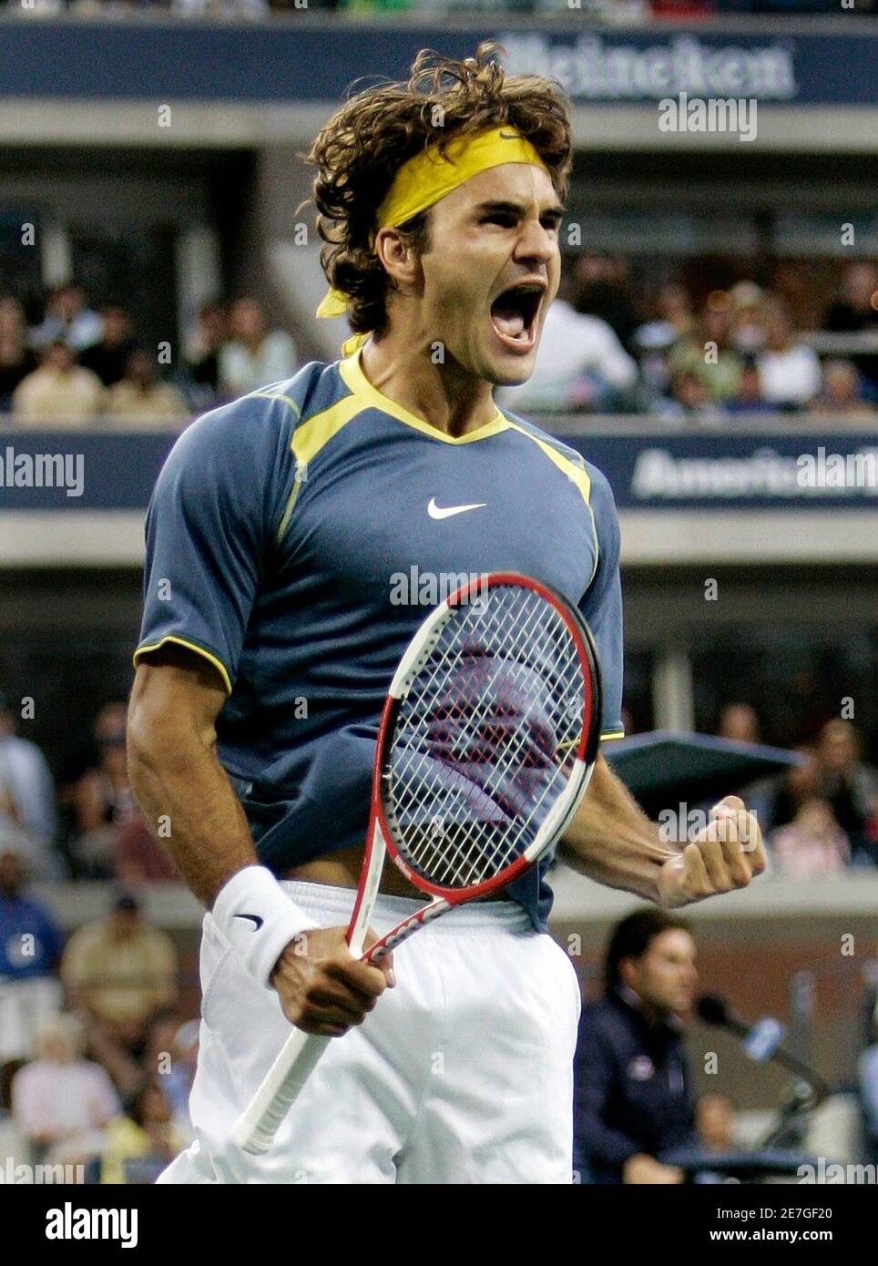 Roger Federer of Switzerland celebrates his win over Andre Agassi of the  U.S. in the men's final at the U.S. Open tennis tournament in Flushing  Meadows, New York, September 11, 2005. Federer