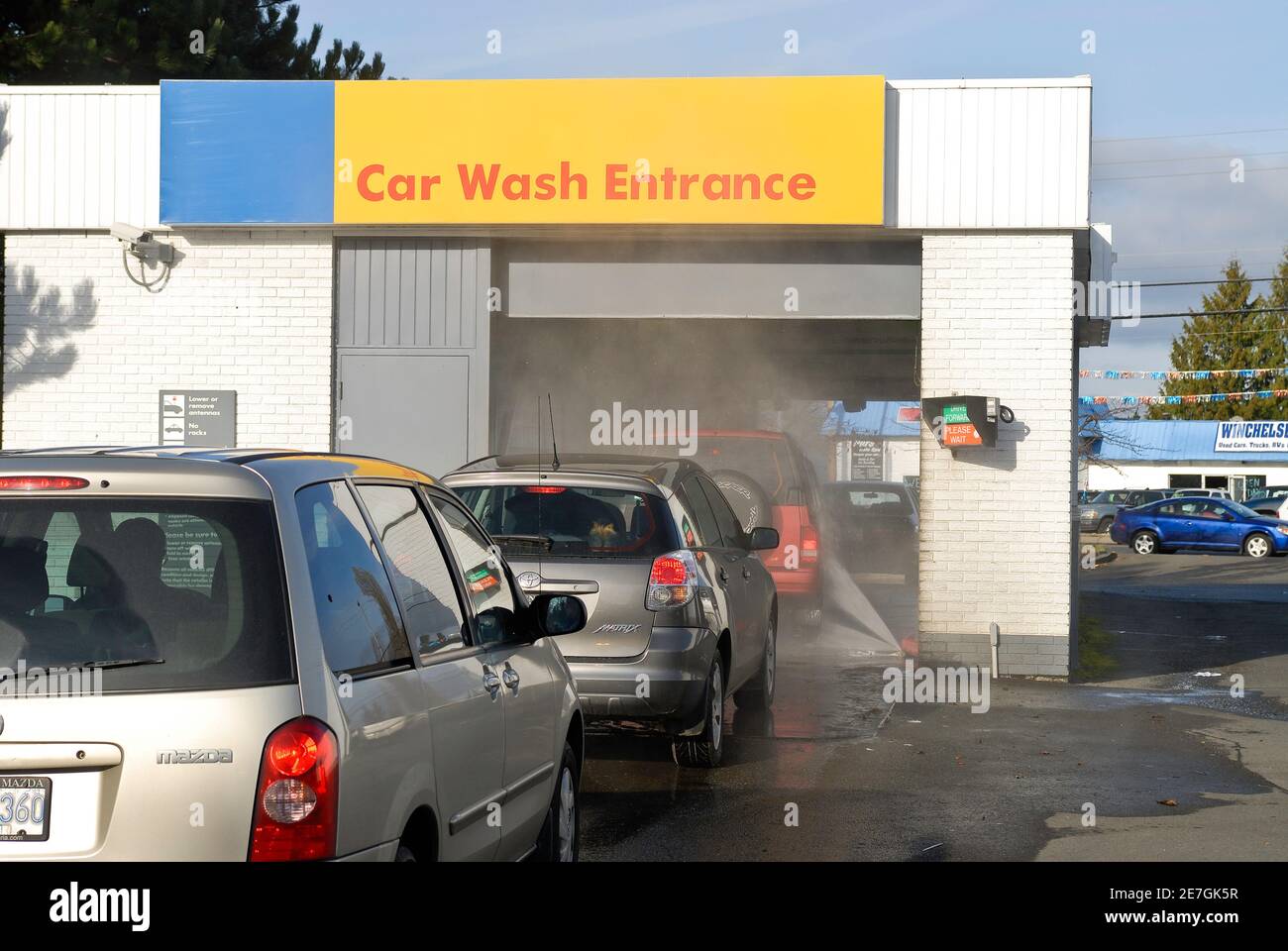 A very busy car wash in Parksville, Vancouver Island, British Columbia Canada. Stock Photo