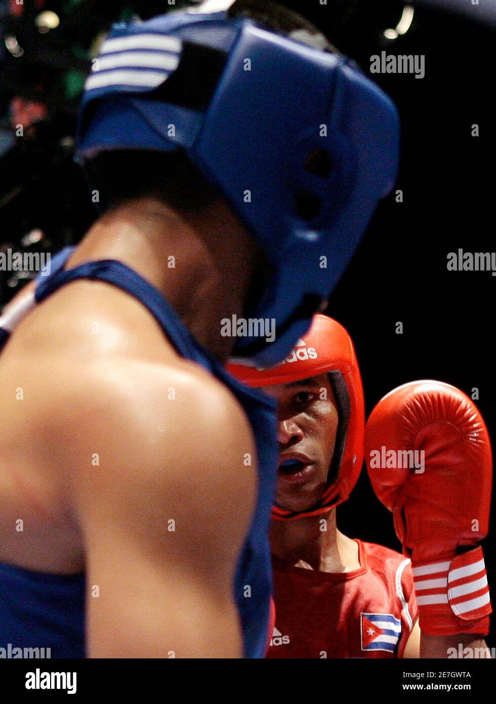 Roniel Iglesias Sotolongo (R) of Cuba and Frankie Gomez of the U.S. fight  during their AIBA Light Welterweight (64Kg) World Championships men's final  boxing match in Milan September 12, 2009. REUTERS/Alessandro Garofalo (