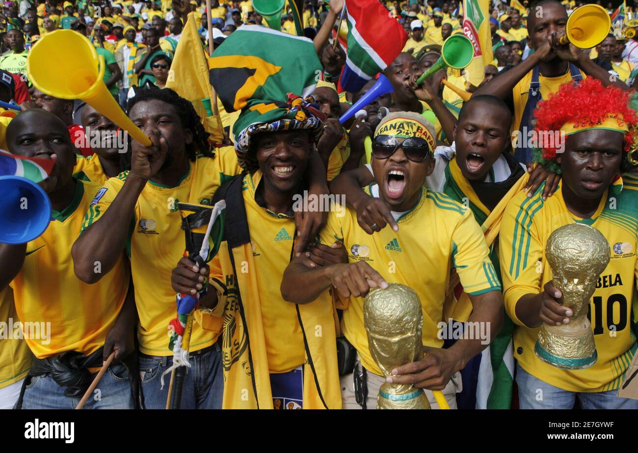 South African fans sing during an international soccer friendly match