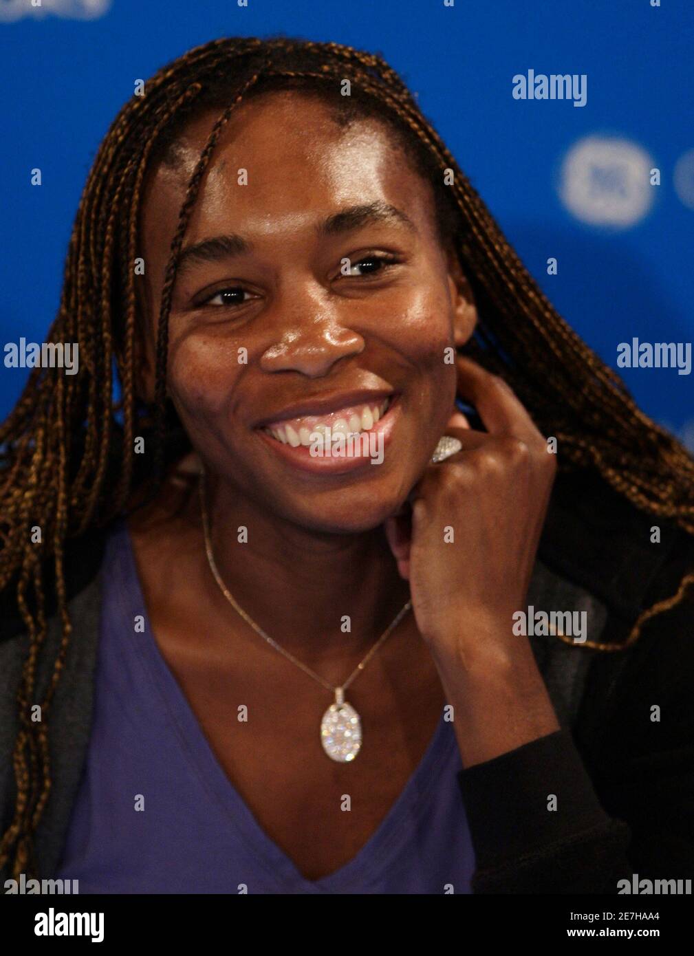 Venus Wlliams of the US smiles as she listens to questions at a news conference in Melbourne January 17, 2009 prior to the start of the Australian Open tennis tournament.     REUTERS/Russell Boyce   (AUSTRALIA) Stock Photo