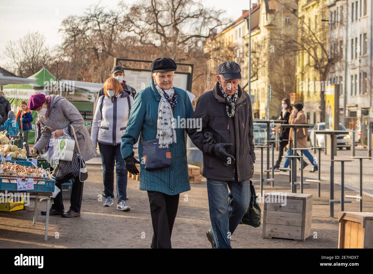 Prague, Czech Republic. 01-29-2021. Portrait of an old couple walking in  the center of Prague during a sunny and cold winter morning Stock Photo -  Alamy