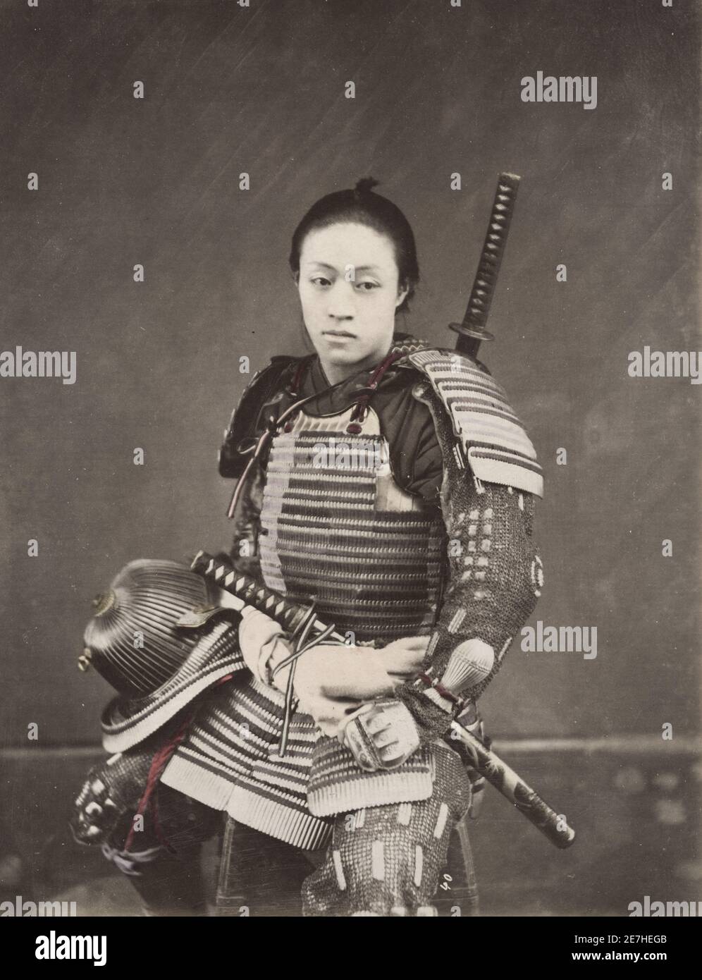 Vintage 19th century photograph: Young samuria with armour and two ...