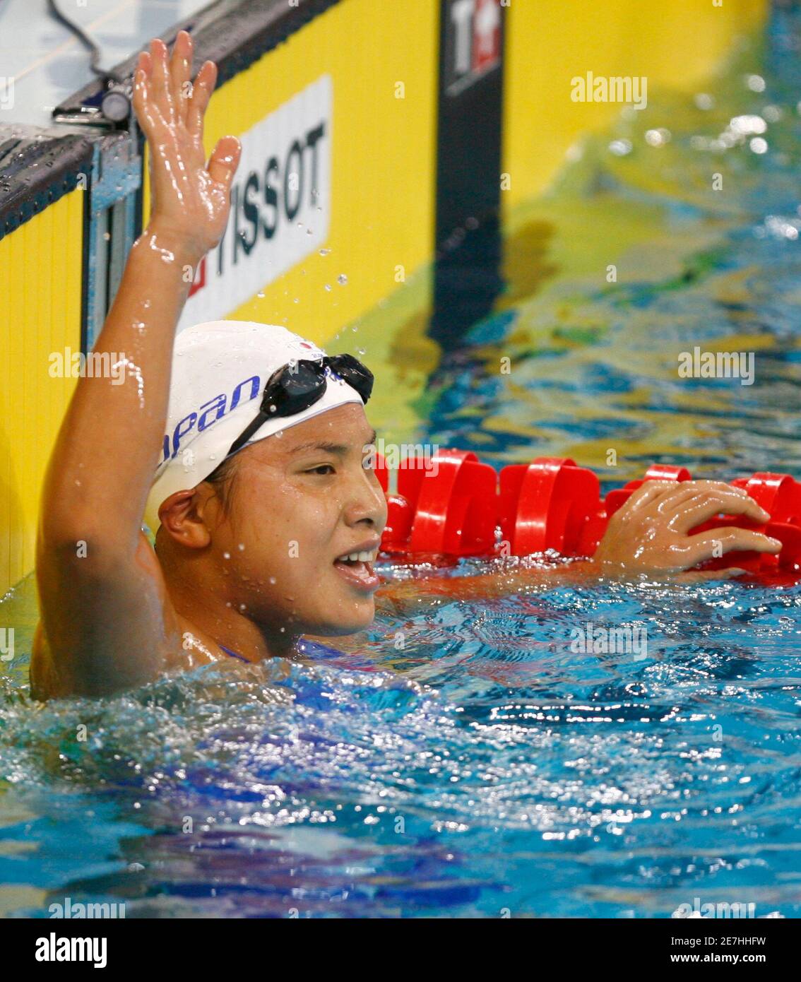 Japan's Yurie Yano waves after winning the women's 800m freestyle swimming  finals at the 15th Asian Games in Doha December 6, 2006. REUTERS/Jerry  Lampen (QATAR Stock Photo - Alamy