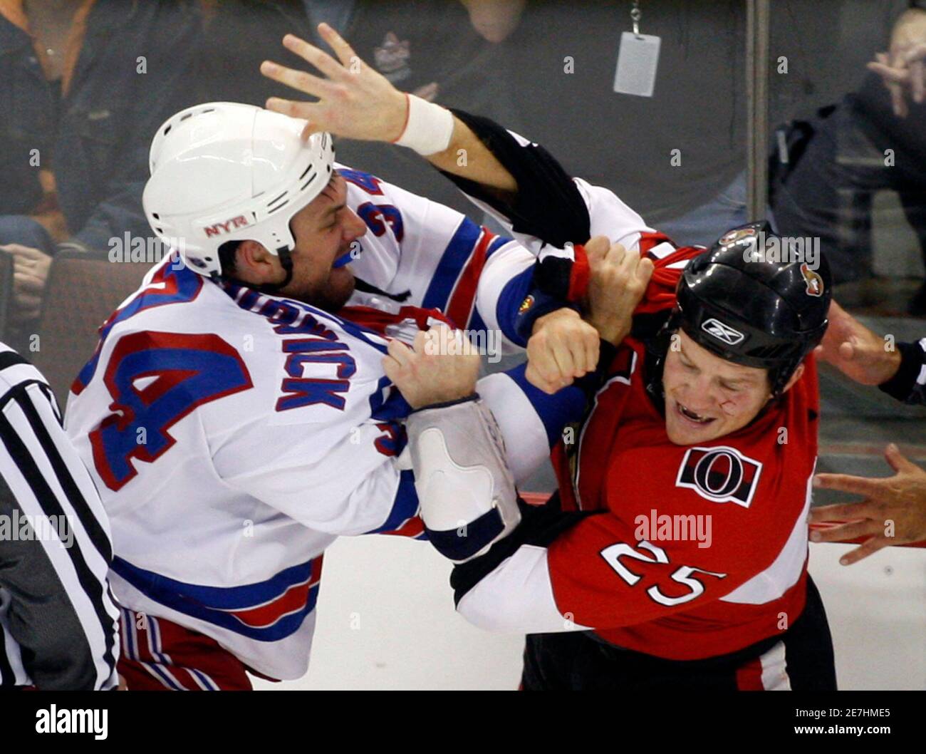 New York Rangers' Jason Strudwick (L) fights with Ottawa Senators' Chris Neil during the first period of their NHL hockey game in Ottawa October 6, 2007.        REUTERS/Chris Wattie   (CANADA) Stock Photo