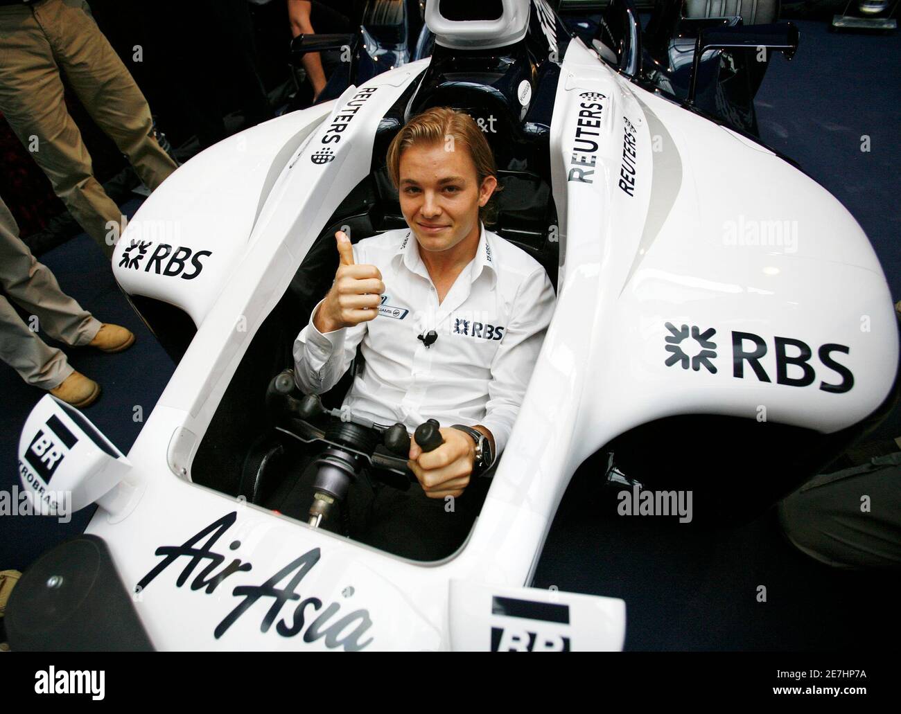Williams Formula One driver Nico Rosberg of Germany gestures after getting into an F1 simulator in Singapore March 18, 2008.  REUTERS/Vivek Prakash (SINGAPORE) Stock Photo
