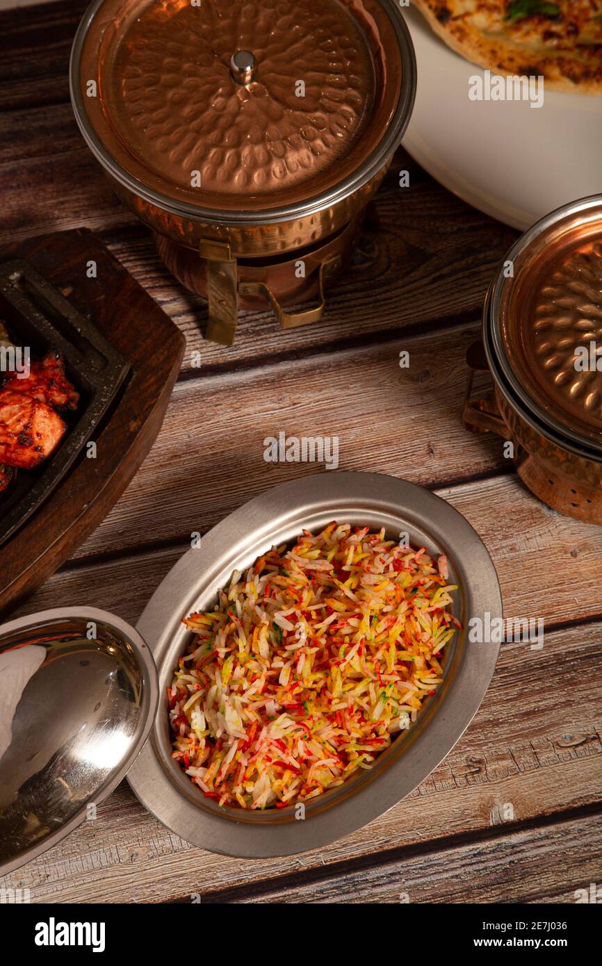 Indian curry meal with basmati rice dish. Vertical picture Stock Photo