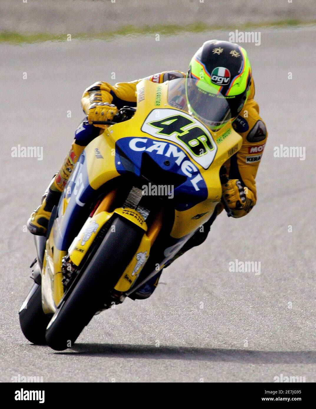 MotoGP world champion Valentino Rossi of Italy rides his Yamaha M1 bike on  the second day of official test in the Catalunya circuit at the Montmelo  racetrack near Barcelona March 4, 2006.